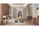Bedroom boasts hardwood floors, stylish lighting, a decorative fireplace, and a designer accent wall at 654 Longleaf Dr, Atlanta, GA 30342