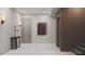 Elegant entrance foyer featuring marble floors, modern lighting, and elevator access for convenient living at 654 Longleaf Dr, Atlanta, GA 30342