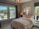 Bright bedroom featuring plenty of sunlight and soothing interior design at 750 Keystone Dr, Woodstock, GA 30188