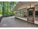 Spacious deck offers stunning views of a lush backyard, perfect for outdoor entertaining and relaxation at 3420 Burnt Hickory Nw Rd, Marietta, GA 30064