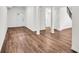 Partially finished basement with wood flooring is perfect for versatile living spaces and storage at 3420 Burnt Hickory Nw Rd, Marietta, GA 30064