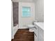 Bathroom showcases modern tile work in the shower and updated fixtures, offering a spa-like feel at 3420 Burnt Hickory Nw Rd, Marietta, GA 30064