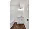 Well-lit bathroom featuring a modern vanity, sleek fixtures, and stylish new bathtub at 3420 Burnt Hickory Nw Rd, Marietta, GA 30064