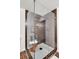 Modern bathroom featuring a frameless shower with custom tile work and stylish fixtures at 3420 Burnt Hickory Nw Rd, Marietta, GA 30064