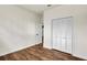 Bright bedroom with spacious closet, neutral walls and sleek hardwood floors at 3420 Burnt Hickory Nw Rd, Marietta, GA 30064
