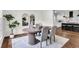 Stylish dining room area with modern light fixture and hardwood floors at 3420 Burnt Hickory Nw Rd, Marietta, GA 30064