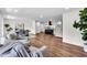 Open-concept living room seamlessly connects to kitchen and dining area, perfect for entertaining at 3420 Burnt Hickory Nw Rd, Marietta, GA 30064