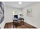Bright office featuring hardwood floors, white walls, and natural light from two windows at 3420 Burnt Hickory Nw Rd, Marietta, GA 30064