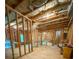 Unfinished basement featuring framed walls, exposed insulation and ductwork offering potential for customization at 6175 Beaver Crossing Dr, Cumming, GA 30040