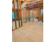 Unfinished basement featuring framed walls, exposed insulation and ductwork offering potential for customization at 6175 Beaver Crossing Dr, Cumming, GA 30040