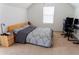 Bedroom with large window, slanted ceiling and office space at 6175 Beaver Crossing Dr, Cumming, GA 30040