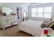 Well-lit bedroom with cozy decor, natural light, and ample space for relaxation at 6175 Beaver Crossing Dr, Cumming, GA 30040