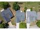 An aerial shot shows a home with mature trees and a well-manicured lawn, perfect for relaxation at 1028 Southwood Dr, Villa Rica, GA 30180