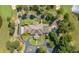 Overhead view of a golf community home featuring a circular driveway and well-manicured landscaping at 1028 Southwood Dr, Villa Rica, GA 30180