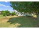 Expansive backyard with lush green lawn and mature trees, perfect for outdoor activities and relaxation at 1028 Southwood Dr, Villa Rica, GA 30180