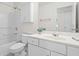 Bathroom features tub/shower combo, large mirror and linen closet at 1028 Southwood Dr, Villa Rica, GA 30180