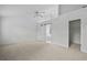 Bedroom features a ceiling fan, ensuite bathroom, and walk-in closet at 1028 Southwood Dr, Villa Rica, GA 30180