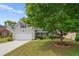 Cozy home with a landscaped front yard, two-car garage, and inviting curb appeal at 1028 Southwood Dr, Villa Rica, GA 30180