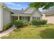 Charming home with a well-kept lawn, lush bushes, and a welcoming front entrance at 1028 Southwood Dr, Villa Rica, GA 30180