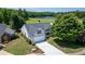 Charming single-Gathering home with a well-maintained lawn and a serene lake view in a picturesque neighborhood at 1028 Southwood Dr, Villa Rica, GA 30180