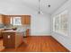 Bright kitchen and eating area with stainless steel appliances, center island, and views of the back yard at 1028 Southwood Dr, Villa Rica, GA 30180