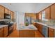 Bright kitchen with stainless steel appliances, center island, and ample cabinet space at 1028 Southwood Dr, Villa Rica, GA 30180
