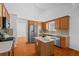 Bright kitchen with stainless steel appliances, center island, and ample cabinet space at 1028 Southwood Dr, Villa Rica, GA 30180