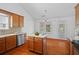Bright kitchen and eating area with stainless steel appliances, center island, and breakfast nook at 1028 Southwood Dr, Villa Rica, GA 30180