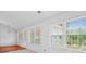 Bright living room with large windows overlooking the back yard at 1028 Southwood Dr, Villa Rica, GA 30180