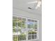 Window with neighborhood view and ceiling fan at 1028 Southwood Dr, Villa Rica, GA 30180
