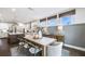 Open-concept dining area with a view of the kitchen, natural light, and comfortable seating at 2905 Medford Drive, Cumming, GA 30041