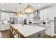 Modern kitchen with a large island, stainless steel appliances, and ample counter space at 2905 Medford Drive, Cumming, GA 30041