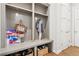 Functional mudroom with custom shelving, built-in bench, and storage baskets, perfect for organization at 3998 Commodore Dr, Atlanta, GA 30341