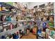 Walk-in pantry boasts abundant storage with floor-to-ceiling shelving at 3998 Commodore Dr, Atlanta, GA 30341