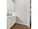 Bright butler's pantry features white cabinets, countertops, and subway tile backsplash at 3998 Commodore Dr, Atlanta, GA 30341