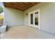 Spacious patio with French doors, offering a seamless transition to the outdoor living space at 3998 Commodore Dr, Atlanta, GA 30341