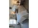 Cozy bedroom with a soft headboard, plush pillows and a bright window view at 4254 Sw Notting Hill Sw Dr, Atlanta, GA 30331
