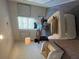 Comfortable home office with a desk and natural light from the window at 4254 Sw Notting Hill Sw Dr, Atlanta, GA 30331