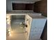 Bright bathroom featuring a dual sink vanity, white cabinets and a large mirror at 4257 Sw Notting Hill Sw Dr, Atlanta, GA 30331