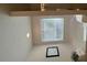 Bright hallway enhanced by natural light from window and features neutral walls at 4257 Sw Notting Hill Sw Dr, Atlanta, GA 30331