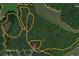 Aerial view of the community's walking trails and neighborhood location by the water at 1313 Cobblestone Ln, Woodstock, GA 30189