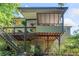 Expansive back deck and screened-in porch offer abundant outdoor living space at 1313 Cobblestone Ln, Woodstock, GA 30189