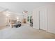 Spacious bedroom with carpet flooring and a large window for ample natural light at 1313 Cobblestone Ln, Woodstock, GA 30189