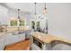 Charming kitchen area with granite countertops and stainless steel appliances and breakfast nook at 1313 Cobblestone Ln, Woodstock, GA 30189
