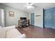 Well-lit office with dark floors, multiple doorways, and a functional workstation at 1313 Cobblestone Ln, Woodstock, GA 30189