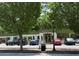 A Panera Bread location with ample parking and lush green trees and curb appeal at 1482 N Decatur Ne Rd, Atlanta, GA 30306