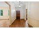 Inviting foyer with hardwood floors, decorative wallpaper, and a wooden front door at 1482 N Decatur Ne Rd, Atlanta, GA 30306
