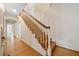 Hallway with stairs and hardwood floors at 1482 N Decatur Ne Rd, Atlanta, GA 30306
