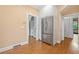 Kitchen area featuring stainless steel refrigerator and entrances to other rooms at 1482 N Decatur Ne Rd, Atlanta, GA 30306
