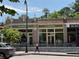 Street view of commercial buildings with awnings and manicured landscaping at 1482 N Decatur Ne Rd, Atlanta, GA 30306